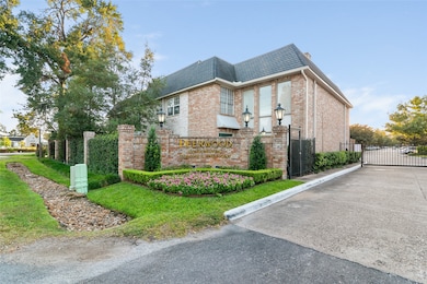 front view of gated Deerwood Condos