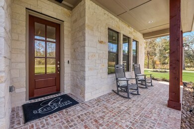 enter through the quaint front porch