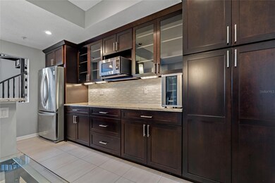 Extended Kitchen prep area with built-In Custom Cabinets and Hidden Pantry