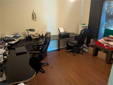 Office space with wood finished floors