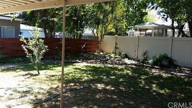 Covered patio and nice back yard