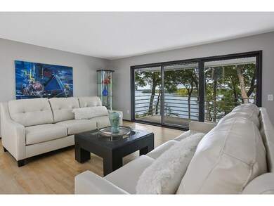 Private lake views from the main level living room