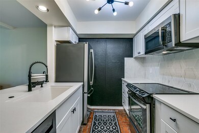 Modern finishes galore in this upgraded kitchen fe