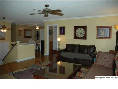 Great Room with Hardwood Floor & Dental Molding