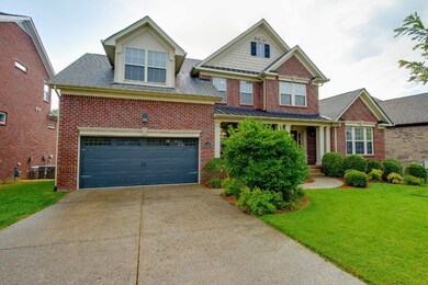 2 car garage and lovely landscaping!
