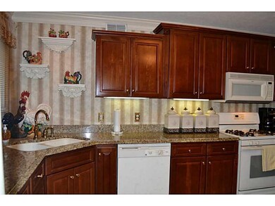 Kitchen. The kitchen has granite counter tops and 