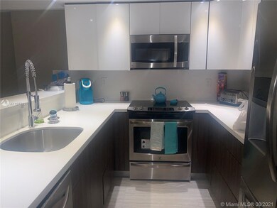 New kitchen with high-end cabinetry and appliances