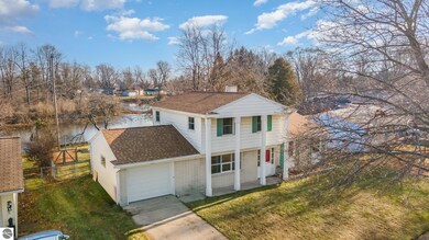 406 Ottawa Dr, Oscoda, MI 48750 - photo 2