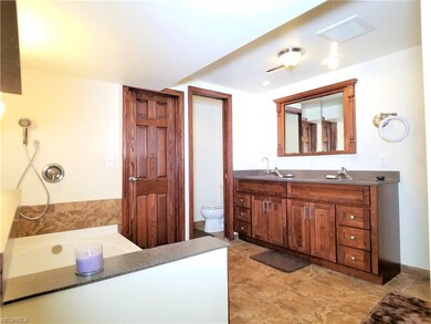 Master bathroom with pocket door creates a private
