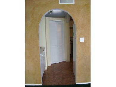 ARCHWAY TO KITCHEN