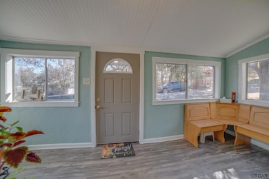 Bright Enclosed Entry w/ Corner Bench