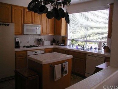 Center island and lots of cabinets in the kitchen.