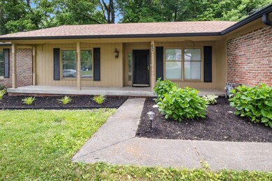 Brick Ranch with A Big Front Porch!