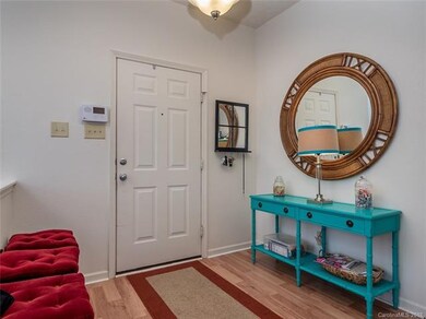 Entry with wood laminate floors