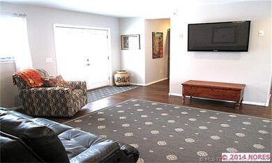 Living area with french doors and deck