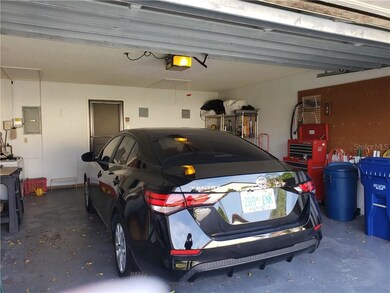 The garage includes attic access.