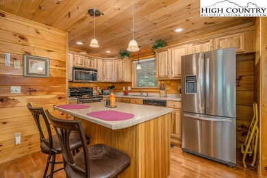 Kitchen with large island with bar seating