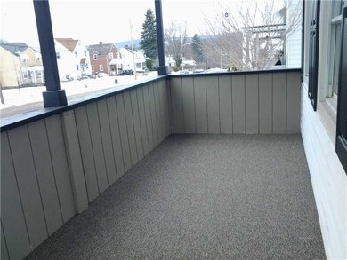 Other. Covered and carpeted 18  x 7  front porch.
