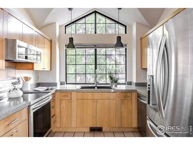 Kitchen with stainless appliances and granite counters