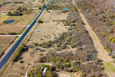 Aerial view of property's location with rural landscape