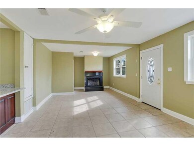 Photo. Living Area with Granite Fireplace