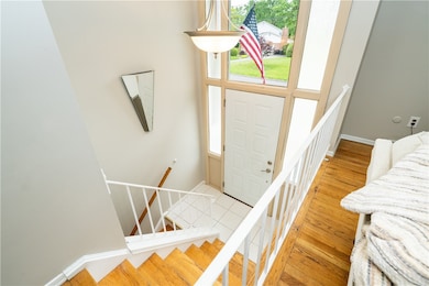 Two story entry with a large picture window.
