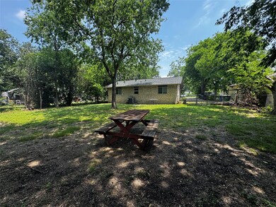 View of yard with central AC