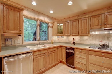 Kitchen with custom Ash cabinetry