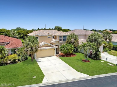 View of front of home featuring concrete driveway,