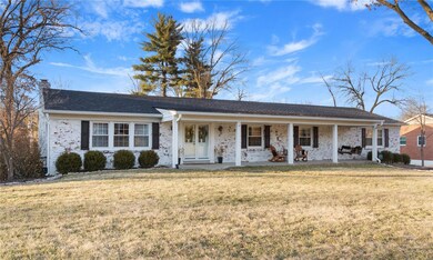 Covered Front Porch & White Mortar Wash Brick