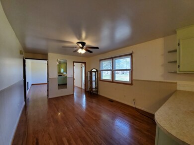 Convenient to the Kitchen is the Dining Area with more of those beautiful floors.