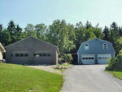 Parking Lot/Garage. Apartment above...