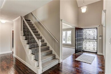 Designer carpet and beautiful hardwood floors.  Wr