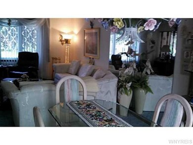 Exterior Front Dining room, looking into the livin