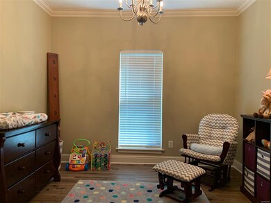 DINING ROOM IS CURRENTLY BEING USED AS A NURSERY A