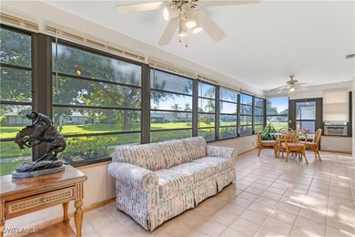 Sunroom featuring cooling unit and ceiling fan
