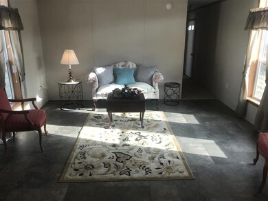 Staged furniture not included as part of sale. Pic