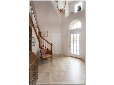 Inviting Two Story Foyer