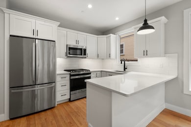 123-125 Centre St unit TH 6, Boston, MA 02124 - photo 6