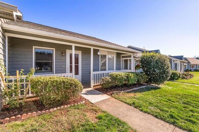 Covered front porch greets you!