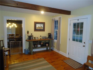Side porch entry from the driveway side and back s