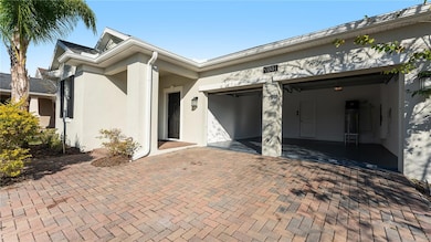 9881 Magnolia Woods Blvd, Orlando, FL 32832 - photo 2