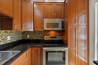 Kitchen features lots of natural light and sizeabl