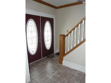 Double door foyer...oak pocket door separates LR f