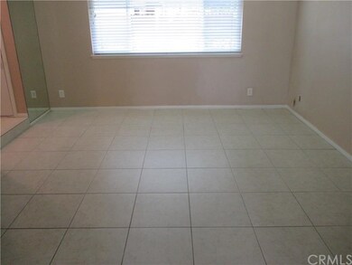 Large Living Room - tile floors