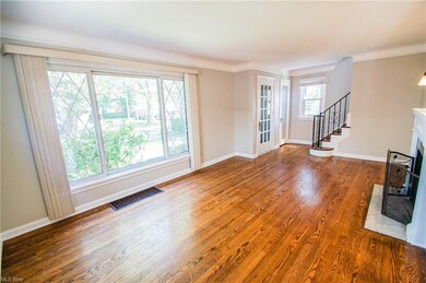 Gorgeous wood floors and fireplace in Living Room