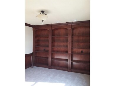 Den. Built in bookcase