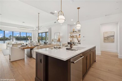 Kitchen featuring pendant lighting, sink, light wo