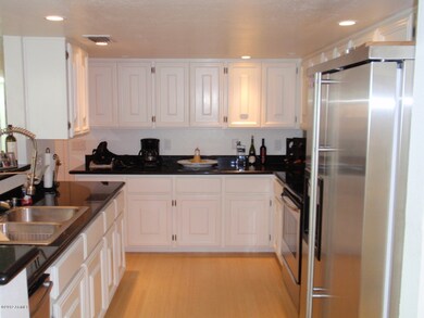 kitchen w/granite and stainless steel