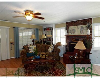 Den/Family/Great Room. Hardwood Floors, Buck Stove